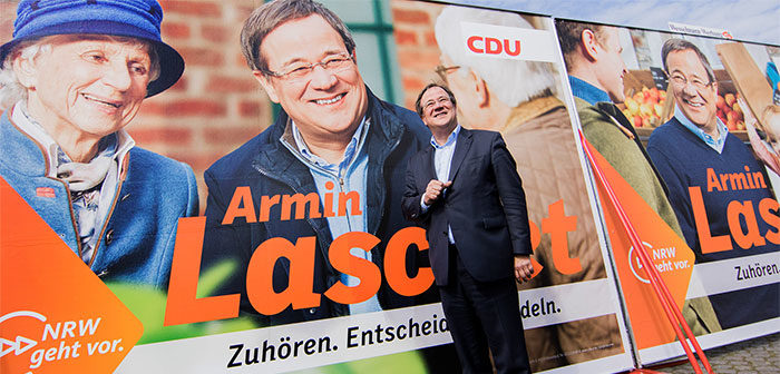 CDU-Landeschef Armin Laschet vor einem Plakat. Bildrechte: dpa